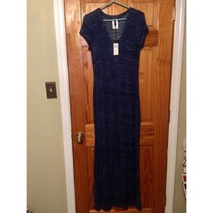 Brand new long Bcbg dress size L. Python print.